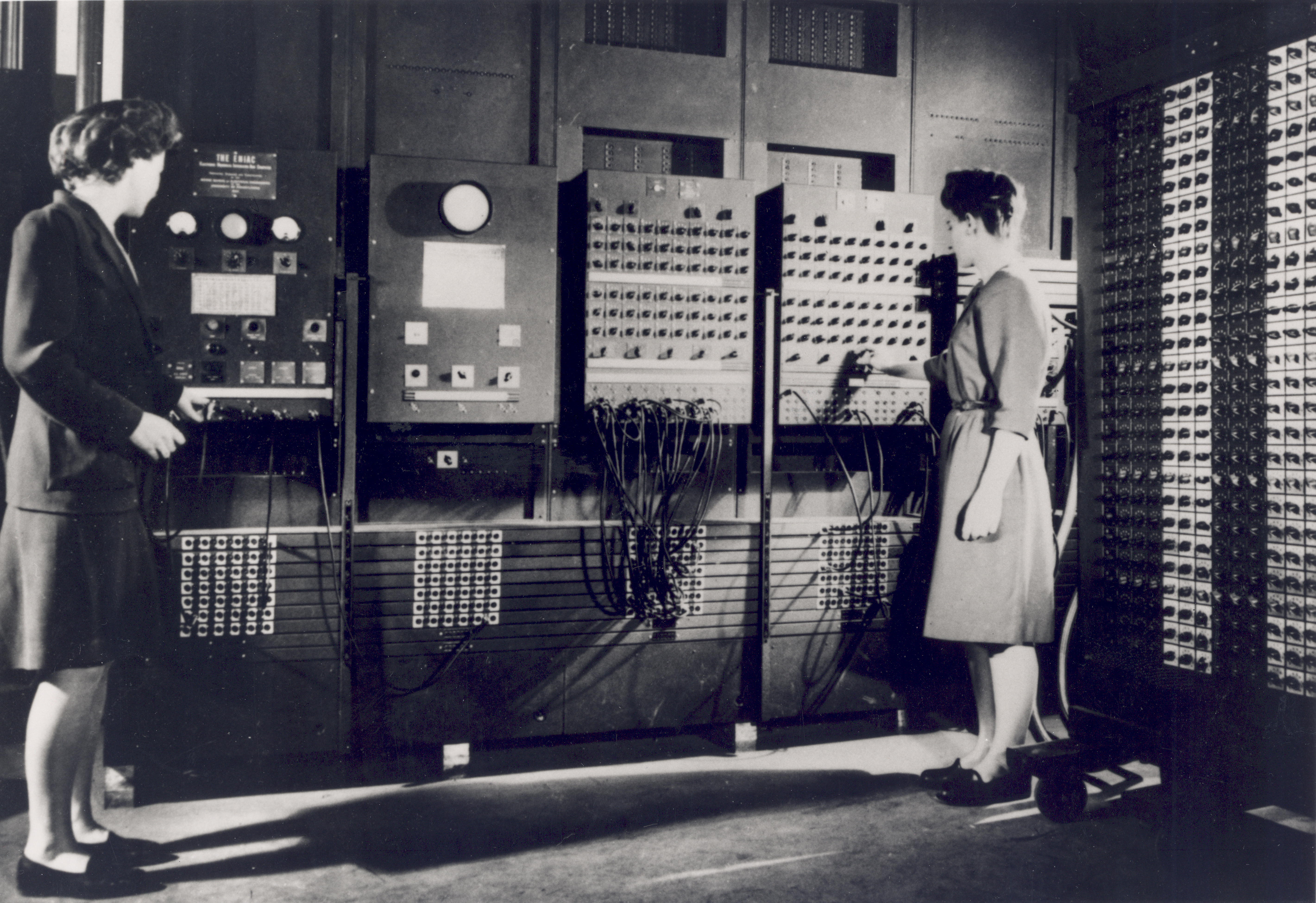 Programmers Betty Jean Jennings and Fran Bilas operating the ENIAC at the Moore School of Electrical Engineering, c. 1945